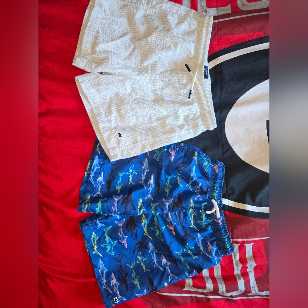Boys crown & ivy size 7. One is swim trunks one is regular shorts